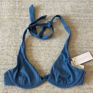 L-Space Blue Bikini Top. Clasp at back with tie at neck. NWT. Size Medium.